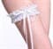 Белая подвязка на ногу с серебристыми нитями - фото 6016